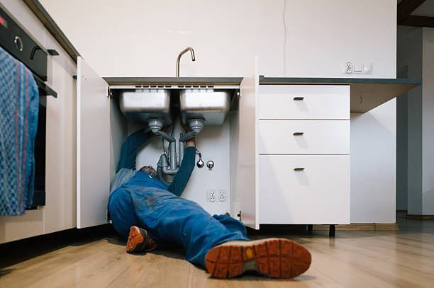 Professional Emergency Plumber technician working in Grand Mound, IA